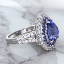 Load image into Gallery viewer, 6.08ct Pear Shaped Blue Sapphire Ring with Sapphire and Diamond halo in 18K White Gold
