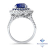 6.08ct Pear Shaped Blue Sapphire with sapphire and diamond halo in 18K White Gold