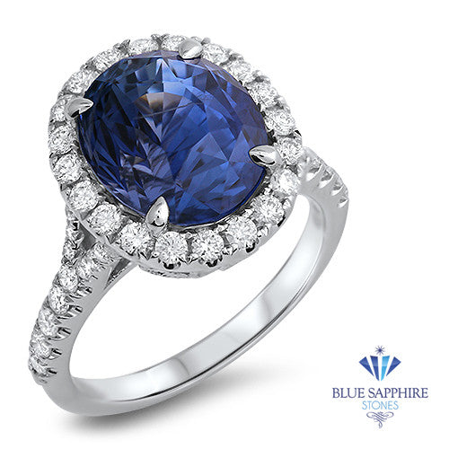 7.86ct Oval Blue Sapphirewith diamond halo in 18K White Gold