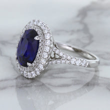 Load image into Gallery viewer, 3.75ct Oval Blue Sapphire Ring with Diamond Halo in 18K White Gold
