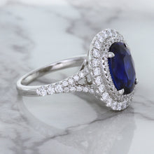Load image into Gallery viewer, 3.75ct Oval Blue Sapphire Ring with Diamond Halo in 18K White Gold
