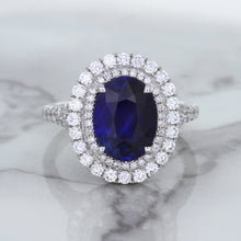 Load image into Gallery viewer, 3.75ct Oval Blue Sapphire Ring with Diamond Halo in 18K White Gold
