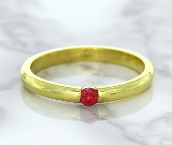 0.10ct Round Ruby Ring in 18K Yellow Gold