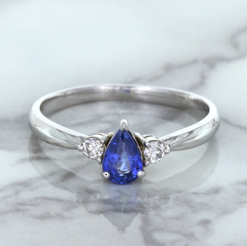 0.59ct Pear Blue Sapphire Ring with diamond accents in 14K White Gold