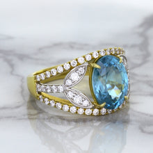 Load image into Gallery viewer, 5.29ct Oval Blue Zircon Ring with Diamond Accents in 18K Yellow Gold
