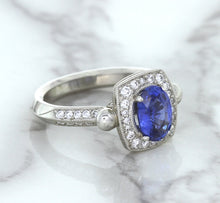 Load image into Gallery viewer, 1.56ct Oval Blue Sapphire Ring with Diamond Halo in Platinum
