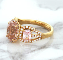 Load image into Gallery viewer, Three Stone Padparadscha Ring with Diamond Halo in 18K Rose Gold
