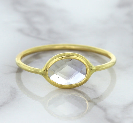 1.33ct. Oval White Sapphire Ring in 14K Yellow Gold