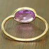 1.45ct. Oval Pink Sapphire Ring in 14K Yellow Gold