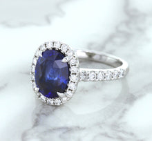 Load image into Gallery viewer, 3.68ct. Oval GIA Certified Blue Sapphire Ring with Diamond Halo in 18K White Gold
