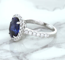 Load image into Gallery viewer, 3.68ct. Oval GIA Certified Blue Sapphire Ring with Diamond Halo in 18K White Gold
