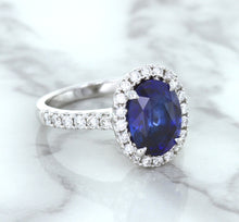 Load image into Gallery viewer, 3.68ct. Oval GIA Certified Blue Sapphire Ring with Diamond Halo in 18K White Gold
