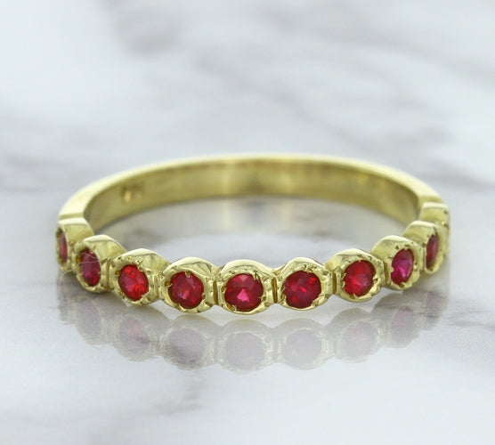 0.30ctw Round Ruby Ring in 14K Yellow Gold