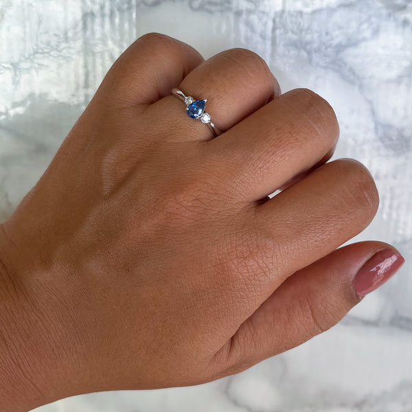 0.59ct Pear Blue Sapphire Ring with diamond accents in 14K White Gold