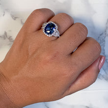 Load image into Gallery viewer, 4.19ct Oval Blue Sapphire Ring with Diamond Halo in 18K White Gold

